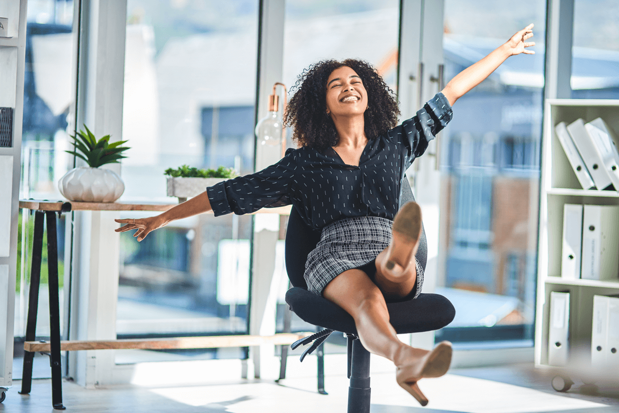 lady in chair relaxed with arms out